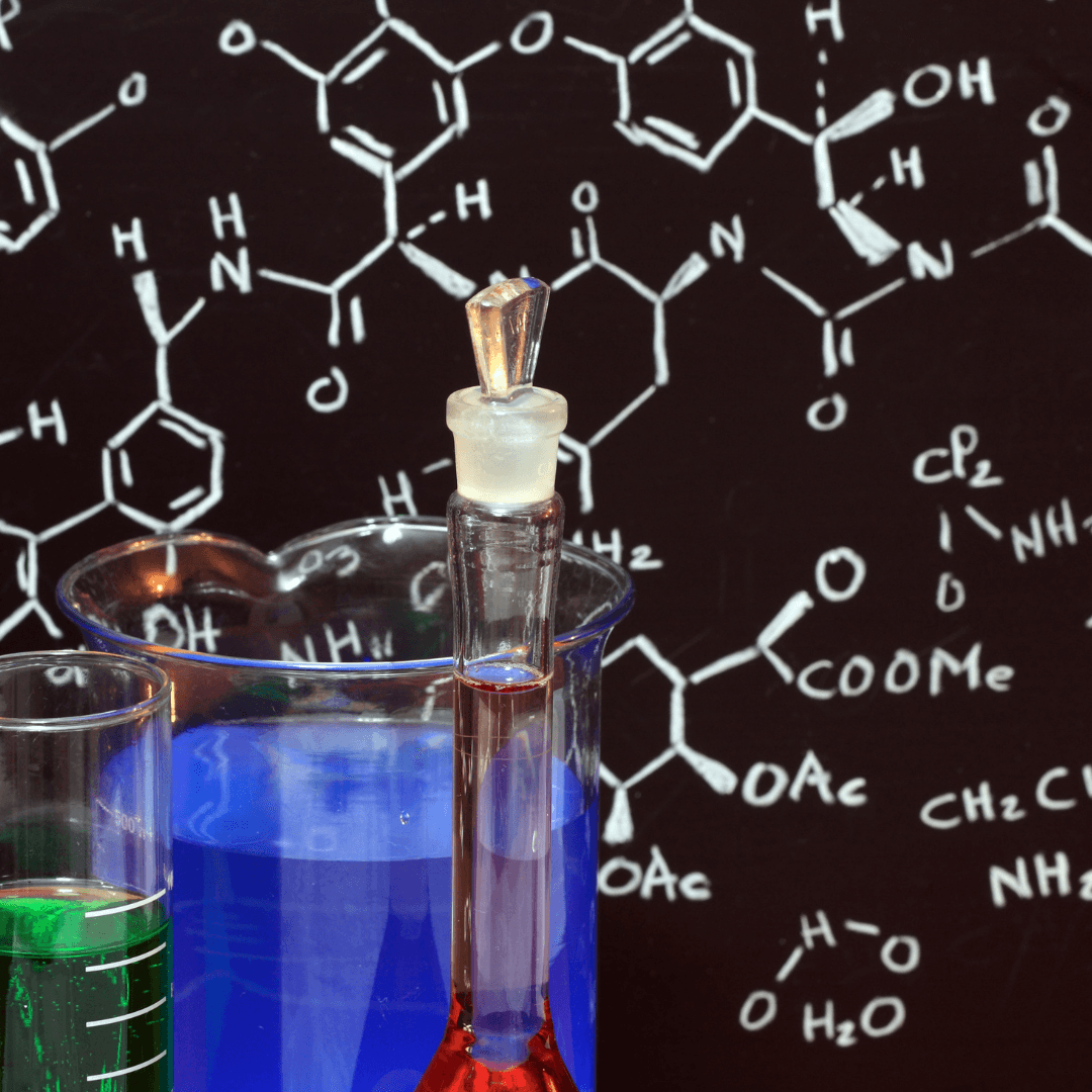 zdjęcie przedstawia wzory chemiczne oraz probówki